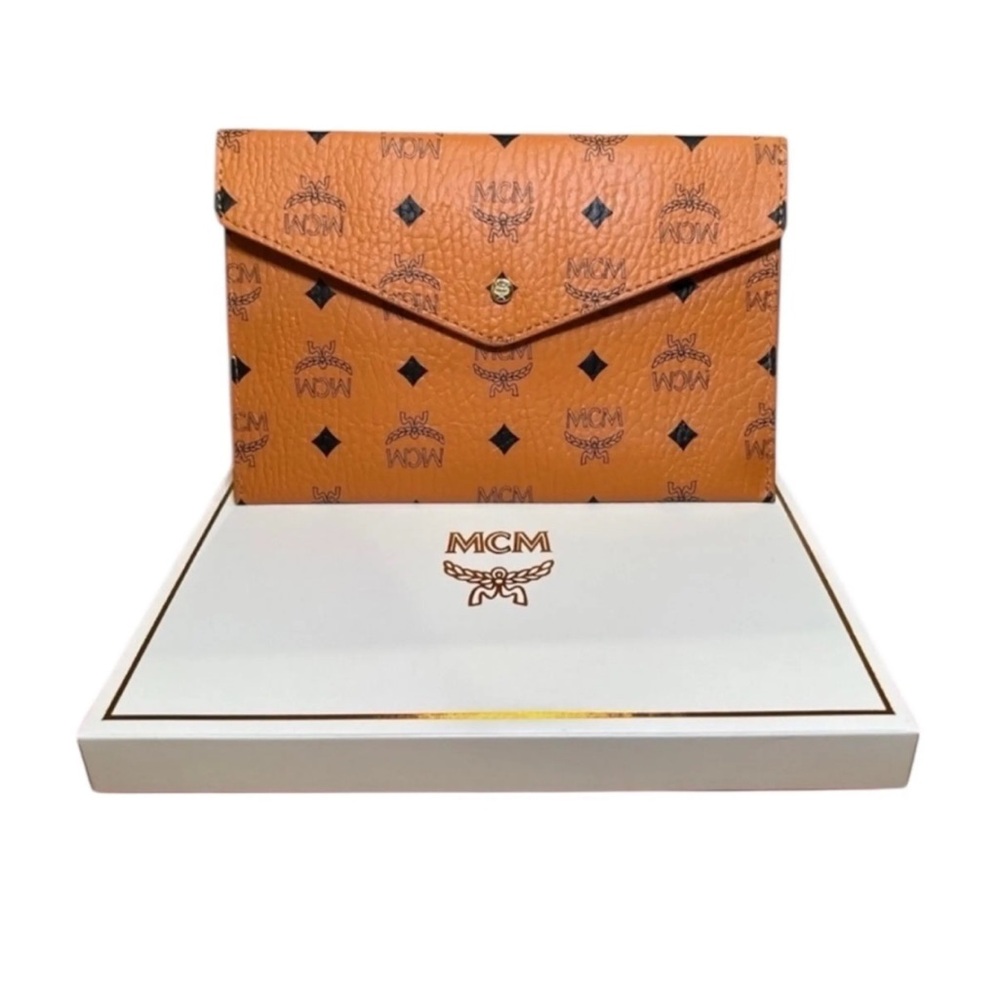 MCM Orange Leather Clutch